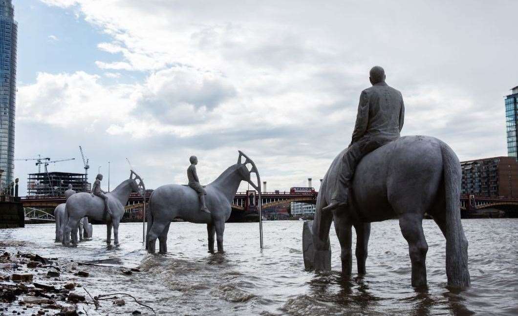 Artist Jason deCaires Taylor surrounded by statues for ‘The Silent Evolution’ installation (inset)