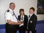 Community Support Officer John Christian with students Liam Hicks and Emily Lipscombe