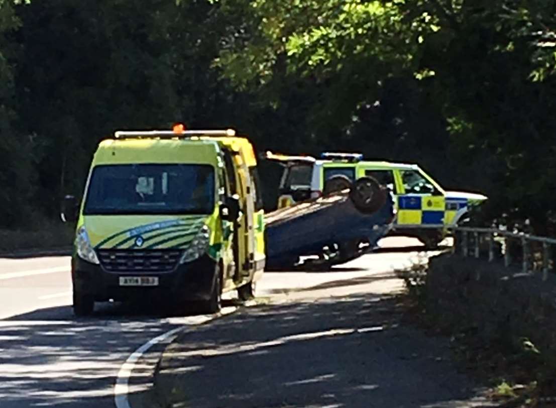 A car has overturned on Sugar Loaf Hill in Folkestone. Picture: Grant Beeny
