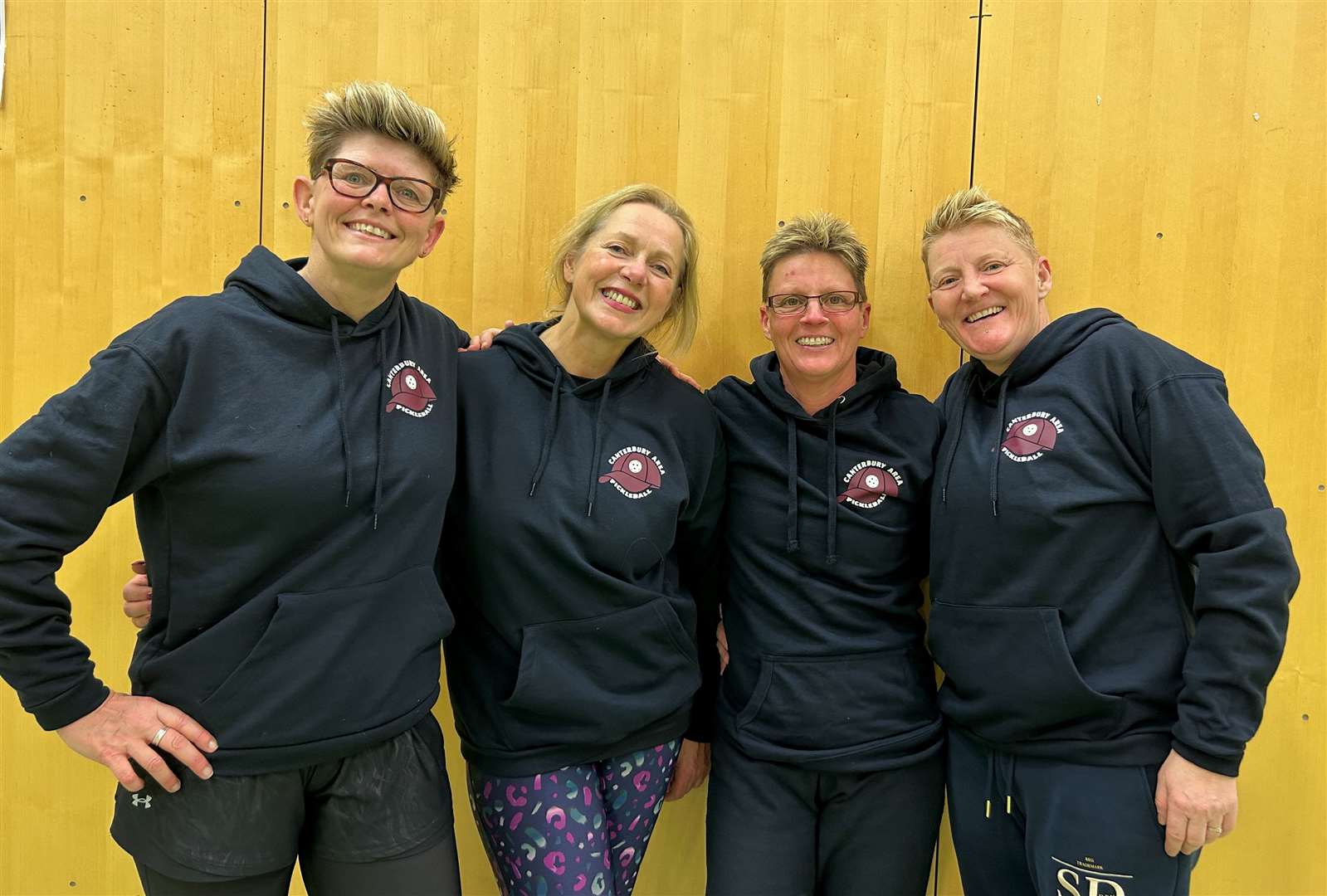 Pickleball coaches Caron Evans, Tracey Taylor and July Daly, with Lisa Evans, are all smiles