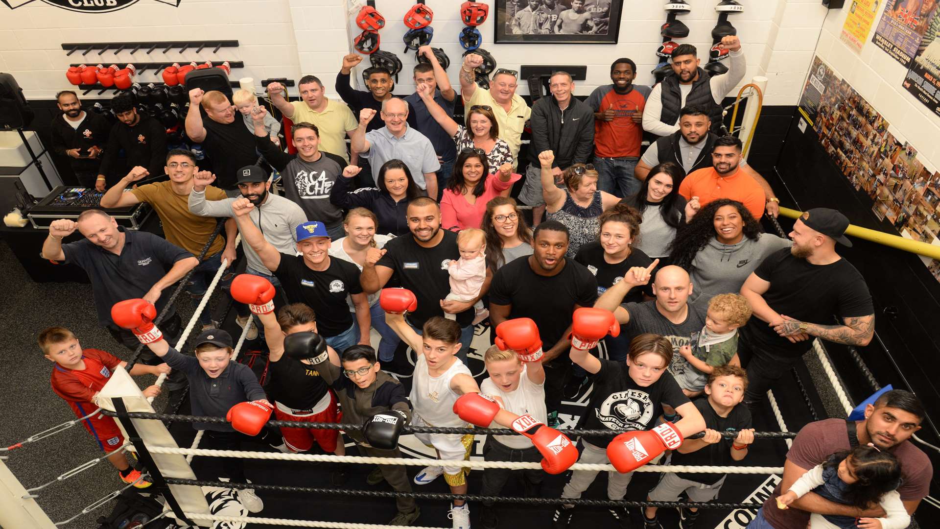 Members, coaches parents and friends in the ring after the reopening of the Gravesham Amateur Boxing Club at the Cygnet Leisure Centre