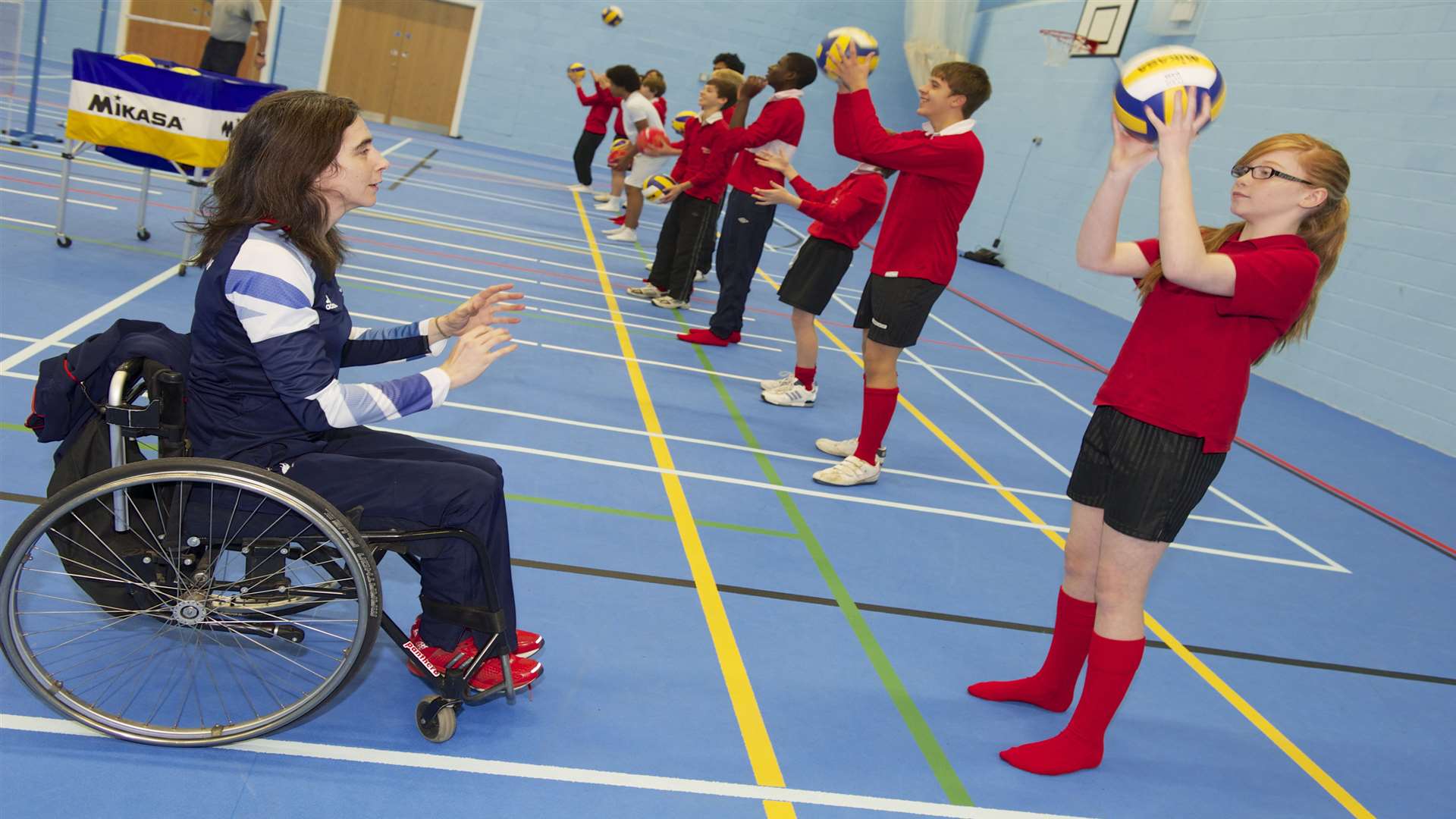 Practical session for the children of Rainham Mark Grammar School, from Team GB paralympic sitting volleyball captain Claire Harvey,