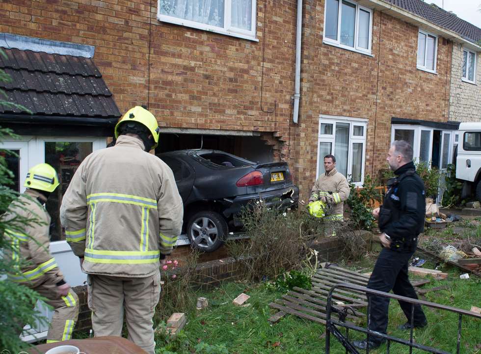 A car has crashed into the front of a house in Silverweed Road, Weedswood. Picture: David Collins