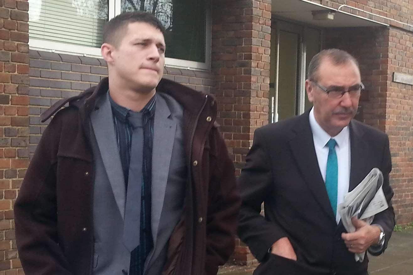 Charlie Cook, 28, leaving Canterbury Magistrates' Court with his father, Cllr Andrew Cook