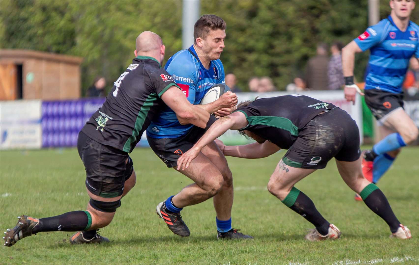 Match action between Canterbury (blue) and North Walsham. Picture: Phillipa Hilton