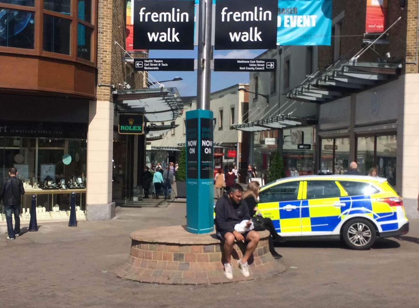 Police at the entrance to Fremlin Walk