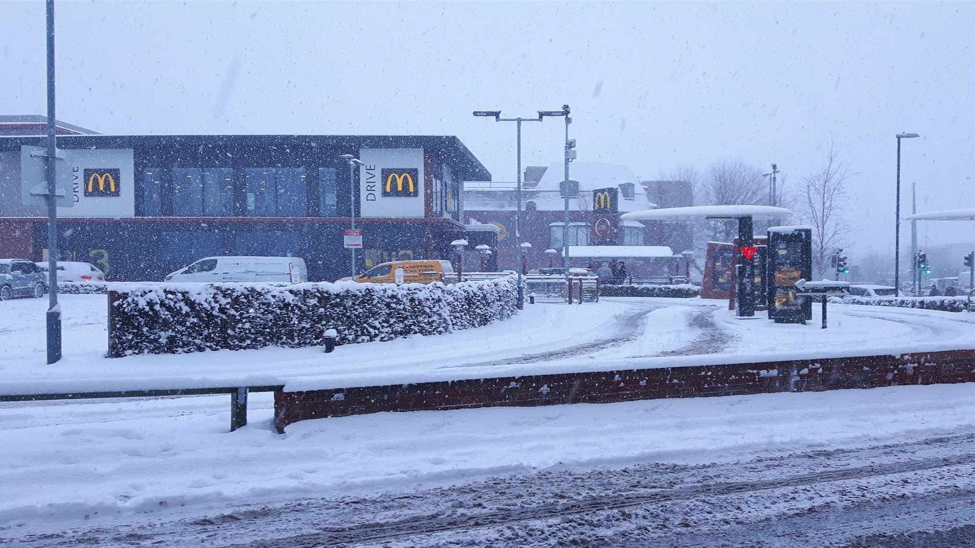 Drivers were undeterred by the snow as they collected their morning McMuffins.