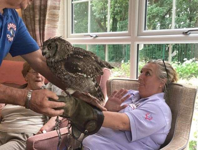 Maria Thurston, lifestyles assistant at Birchwood Heights Care Home has overcome her fear of birds after holding an owl