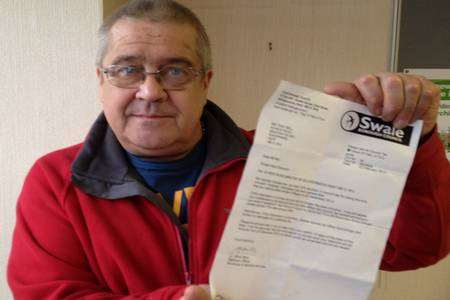 Tony Bell with his letter from Swale council after a "joke" about his marital status nearly cost him his council tax discount