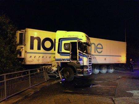 Officers searched for the driver of this lorry which crashed in to railings at the junction of Chestnut Street and Key Street roundabout.