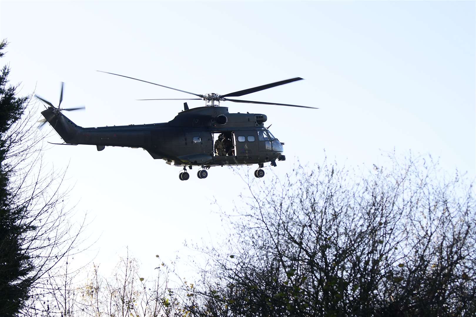 An Army helicopter surveys the motorway on Christmas day. Picture: Barry Goodwin