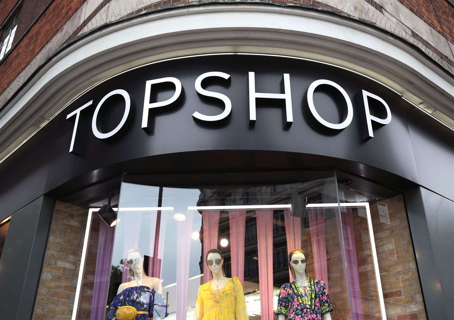 People walking past Topshop in Oxford Street (Yui Mok/PA)