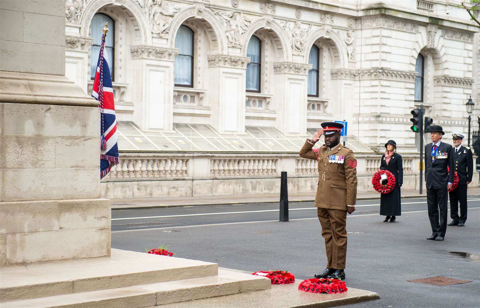 Representatives of the Royal Navy, British Army, Royal Air Force and Merchant Navy laid wreaths (Dominic Lipinski/PA)