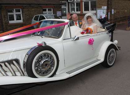 Is this the classiest voting car? Cris and Avril in the wedding car