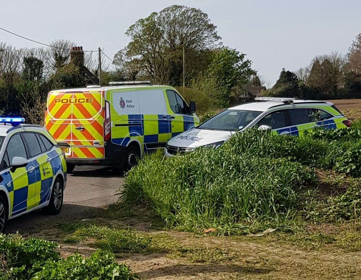 Police cars arrive at the field in Borden with nesting skylarks. Picture: Vivien Smith