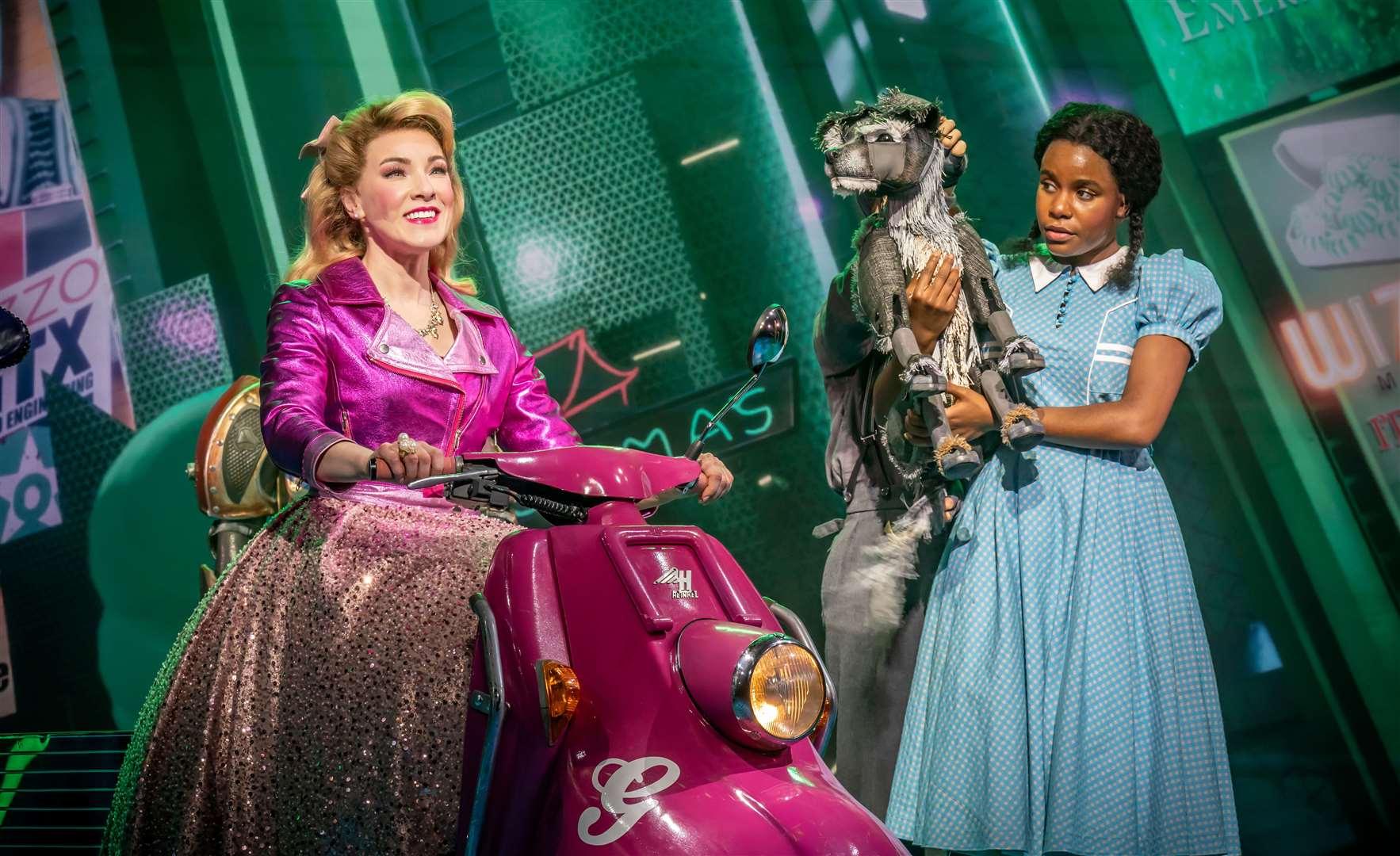 Glinda is a modern Good Witch with a moped and remote control wand. Picture: Marc Brenner