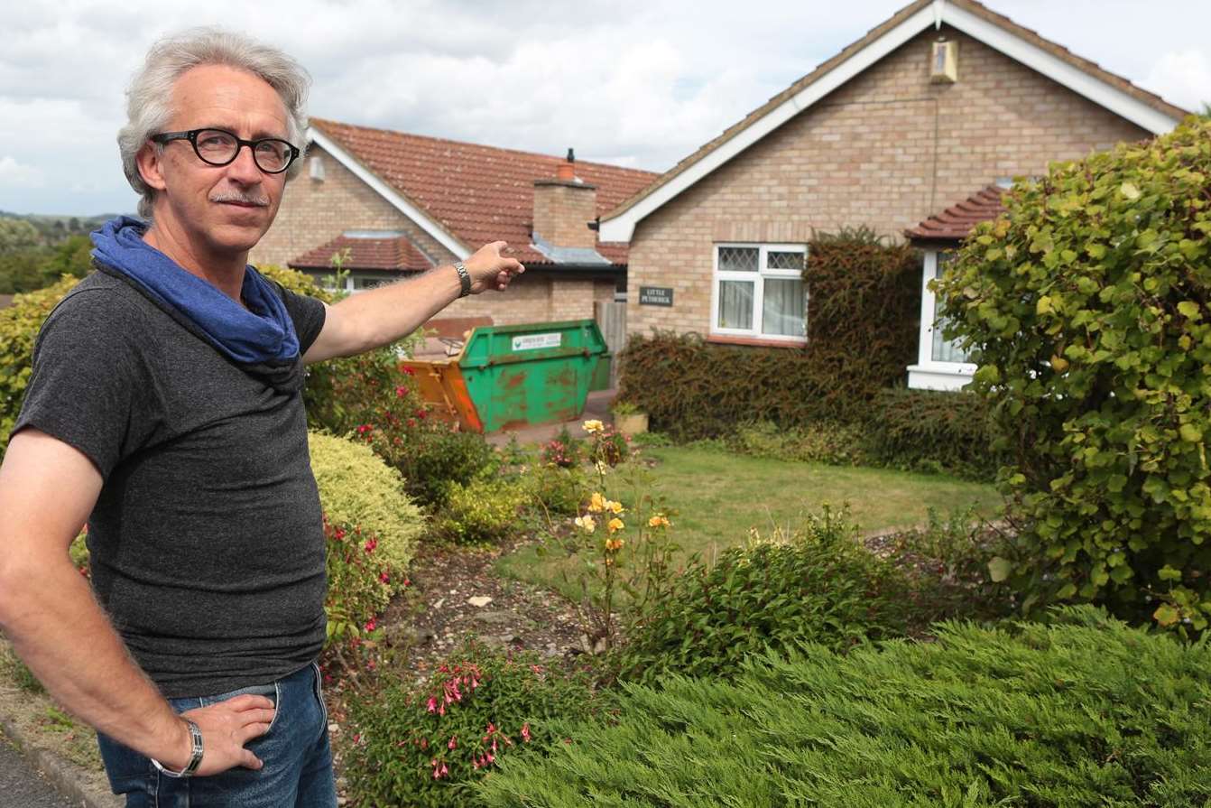 Marco Hilgers in front of the house where he saved his elderly neighbour from a fire