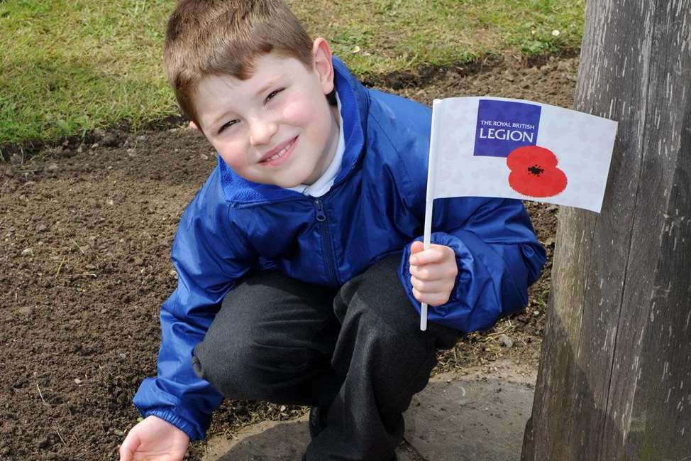 Newington school pupil Ryan, eight, planted his poppy seeds next to the A2 back in April