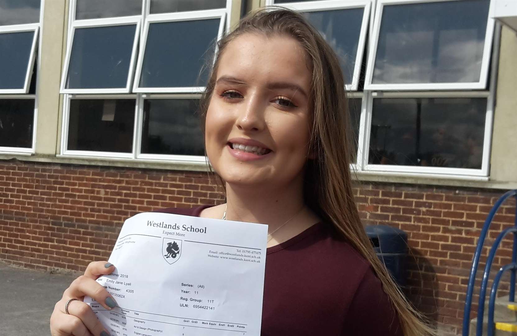Westlands head girl Emily Lyall collecting her results