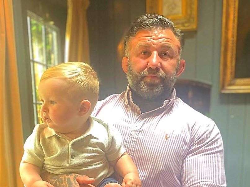 Carl Ambrose, owner of Rhino & Bull's, with son Bear. Picture: Carl Ambrose