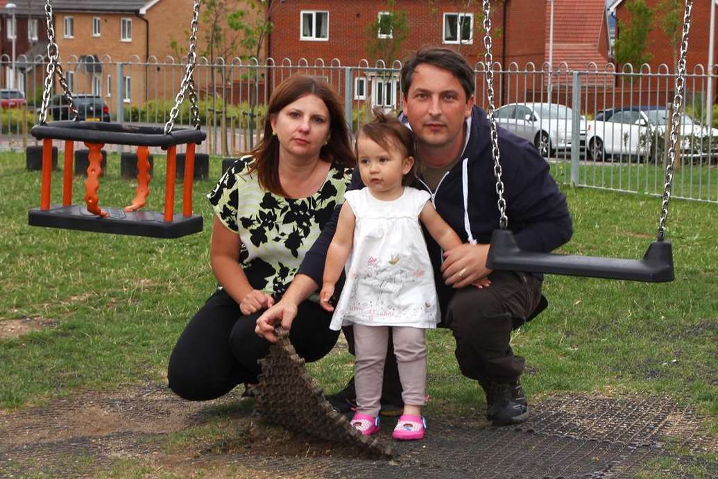 Monika and Gary Barwell with baby daughter Lena in the play area in Hoo which has been plagued by yobs