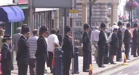 Officers of the Kent force line the streets as a mark of respect