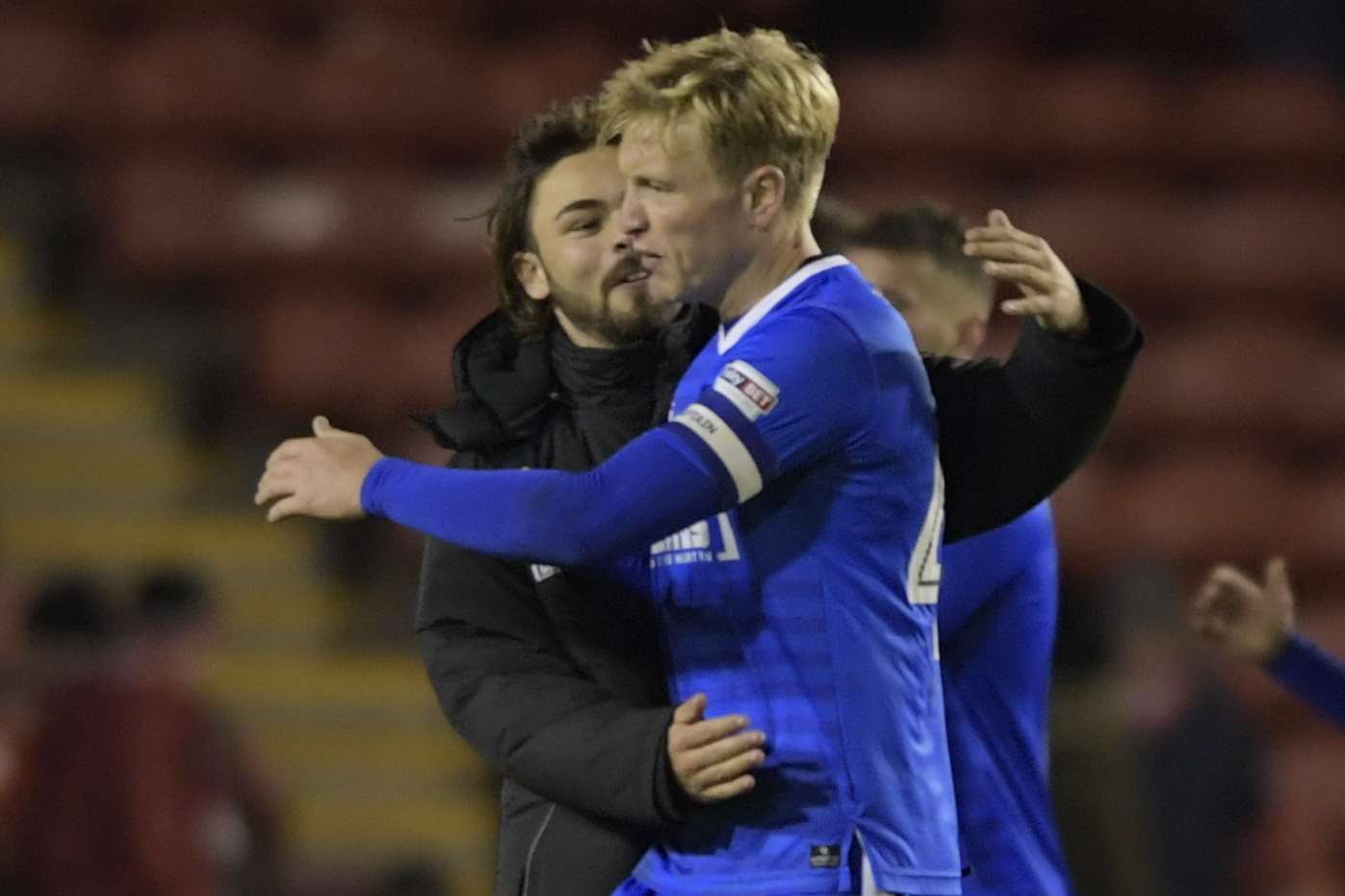 Bradley Dack and skipper Wright embrace at the final whistle Picture: Barry Goodwin