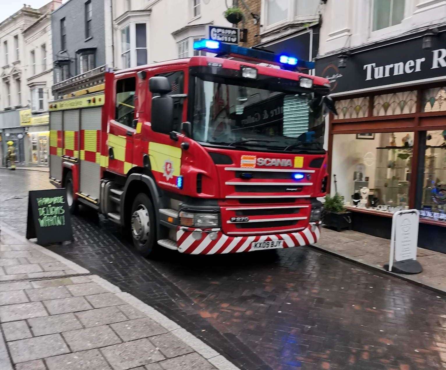 Fire crews in Harbour Street worked all through the afternoon and into the evening to make the area safe. Picture: Turner Rowe Art Centre & Gallery