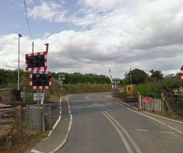 A lorry is stuck on a level crossing at Teynham