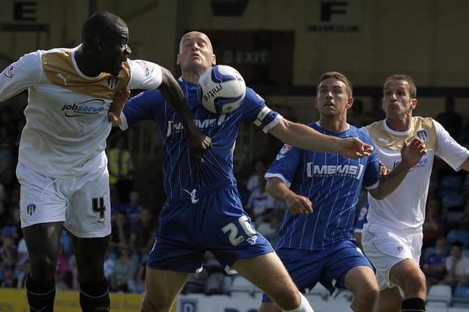 Captain Adam Barrett looks to clear the ball against Colchester. Picture: Barry Goodwin