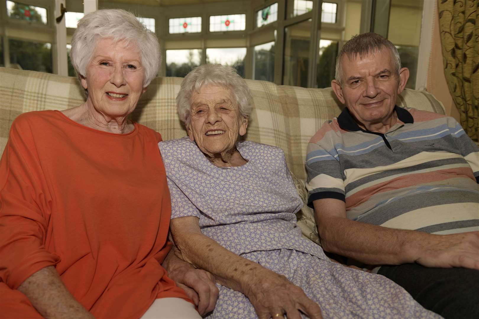 Julia Carr, photographed for her 105th birthday last year, with her daughter Pamela Carr-Hurdwell, and son-in-law Jonno Carr-Hurdwell. Picture: Barry Goodwin
