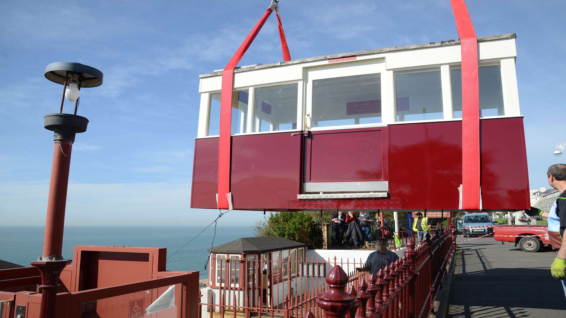 The carriage body being hoisted back in to place after refurbishment of the Leas Lift