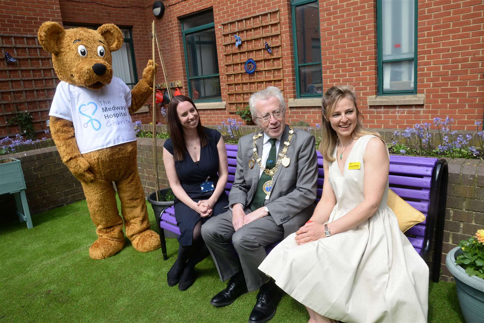 Mayor of Medway Cllr Steve Illes chats with April Thompson and Jenny Holiday at the opening of the dementia garden at the Medway Maritime Hospital on Wednesday. Picture: Chris Davey. (9488442)