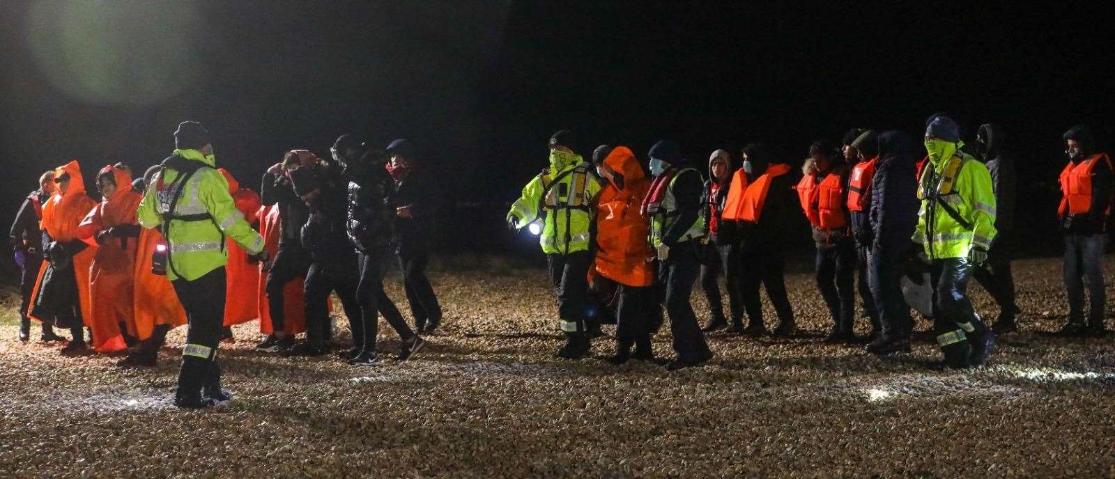 Asylum seekers including young children are rescued and land at Dungeness Picture: UKNIP