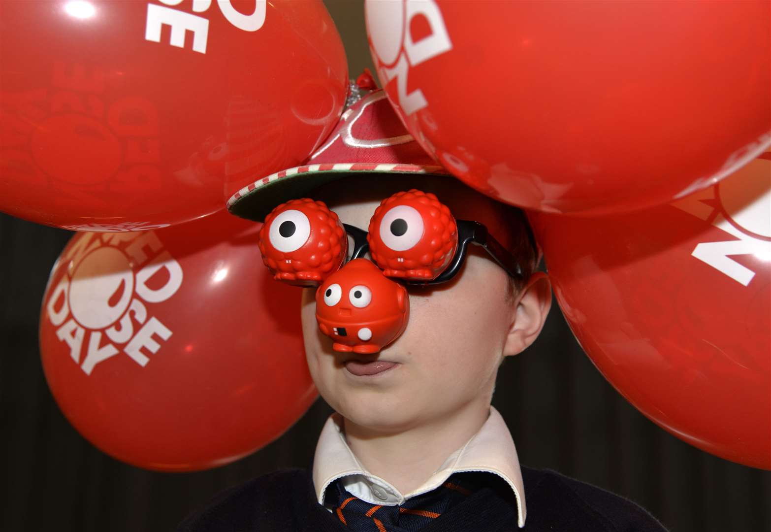 Pupils are urged not to buy new plastic red noses for Comic Relief