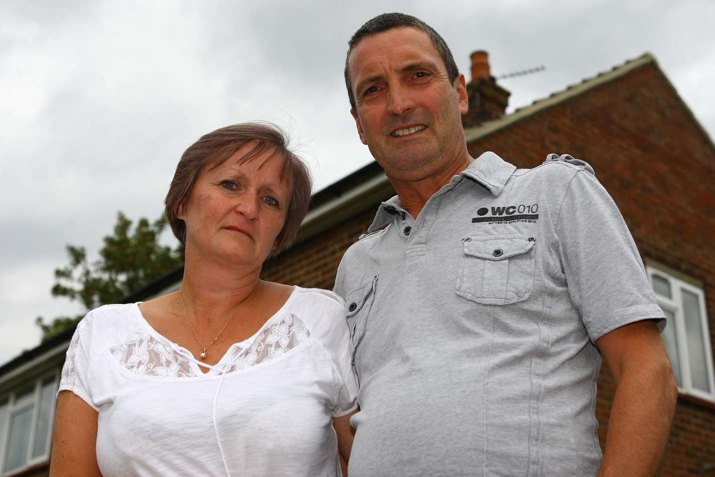 Couple Sue and Garry Coombes outside their home in Woodside Road, Sturry