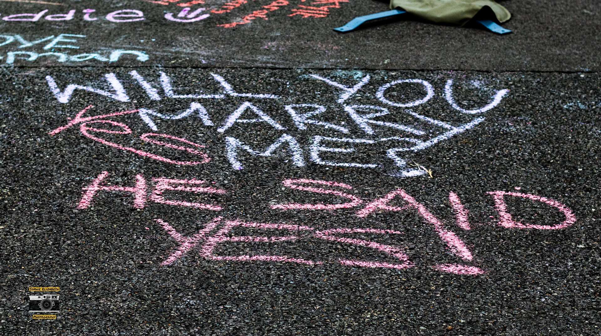 The chalked wedding proposal at this year's festival. Image by Sophie Elizabeth