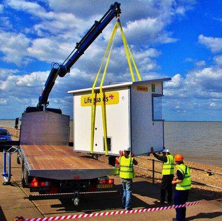 One of the RNLI huts is lifted into place along Minster Leas