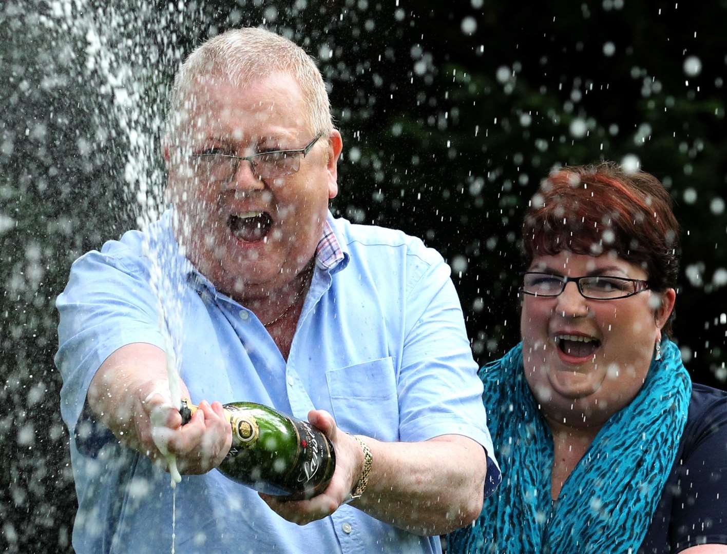 Colin and Chris Weir, from Largs in Ayrshire, celebrate their win. (Andrew Milligan/PA)