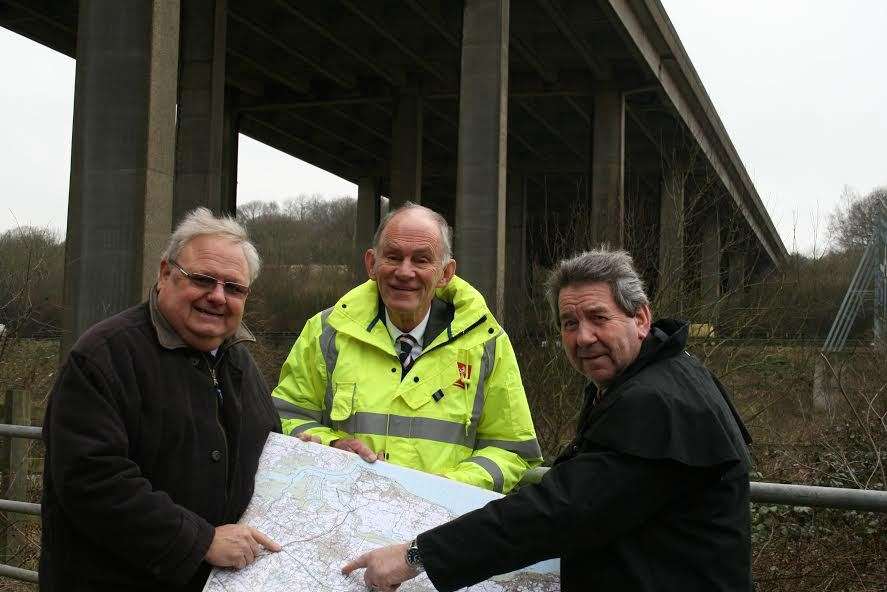Cllr Andrew Bowles, leader of Swale council, Cllr David Brazier, KCC cabinet member for transport, and MP Gordon Henderson looking at the proposed Junction 5 below the elevated section of the M2