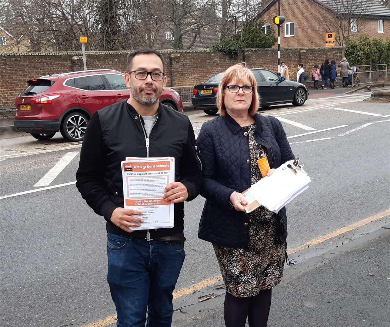 GMB union campaigners Nick Day and Jackie Warr held discussions with parents outside the Brent Primary School in Dartford