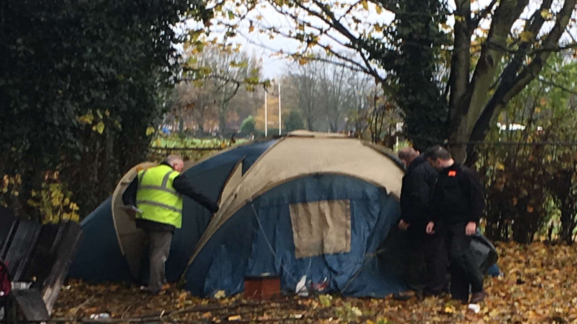 Bailiffs and a Medway Council building surveyor check the tents