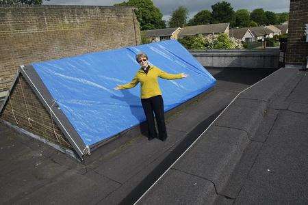 Rev Bonnie Appleton on the roof of St Matthew's Church, Wigmore, which has been targeted by lead thieves