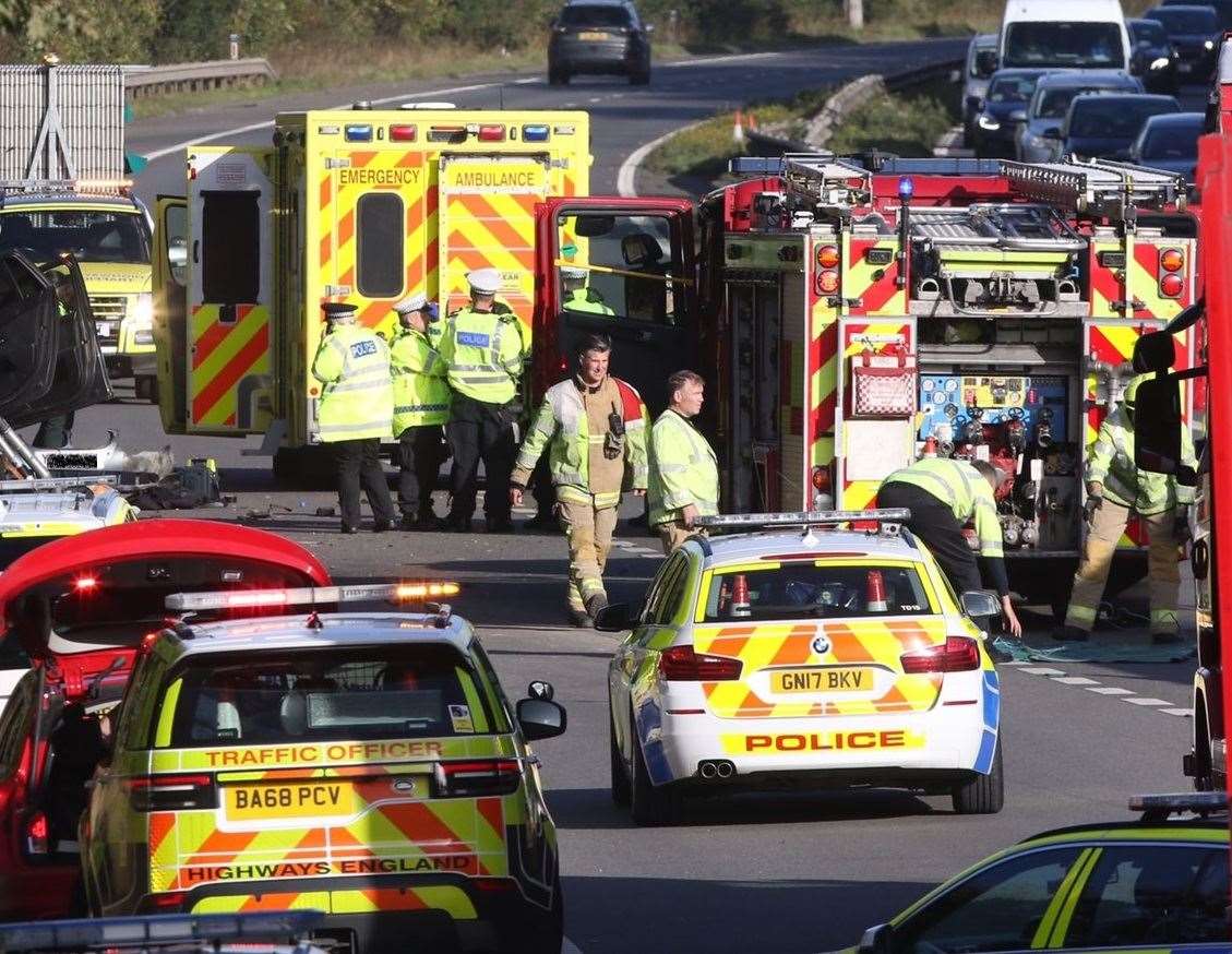 Police at the scene of the crash on the M2 between Gillingham and Sittingbourne. Picture: UKNIP (18872169)