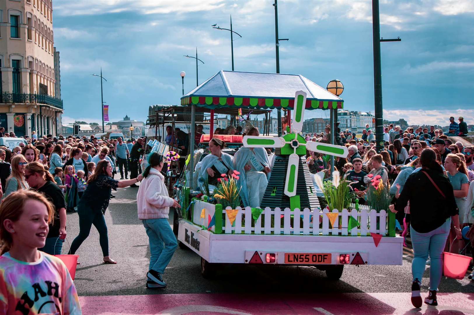 Margate Carnival 2023: A green windmill was among the colourful floats. Picture: Louis Mclaren