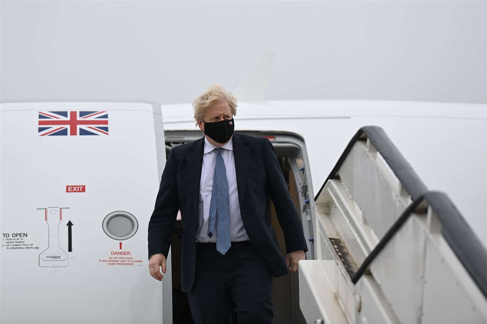 Mr Johnson arriving in Brussels (PA)