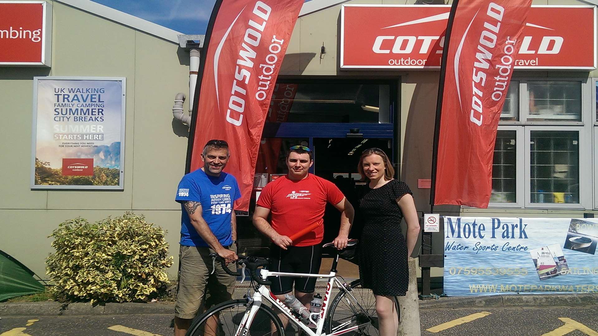 Local marketing representative Ian Foster and assistant manager John Blackman, both from Cotswold Outdoor Maidstone which is supporting the KM Charity Walk, pictured with Tracey Crouch MP.