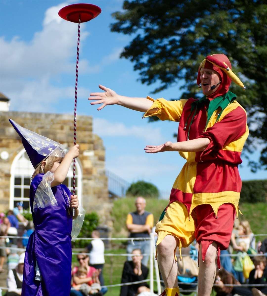 A jester entertains at the Medieval Fair at Tonbridge Castle Picture: Tonbridge and Malling council
