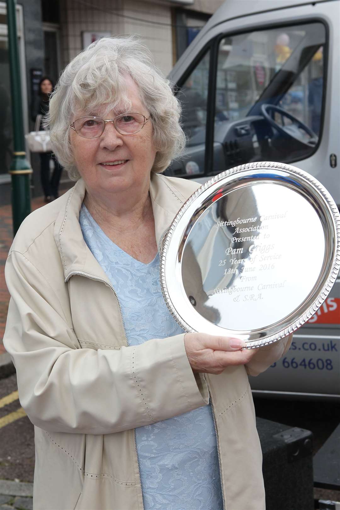 Pam Griggs with a shield to mark serving 25 years of chairing the Sittingbourne Carnival Association. Picture: John Westhrop