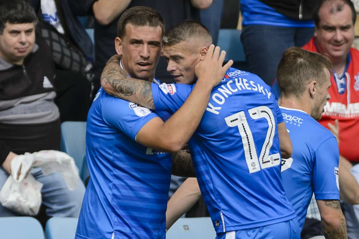 Cody McDonald congratulated by Paul Konchesky after opening the scoring Picture: Andy Payton